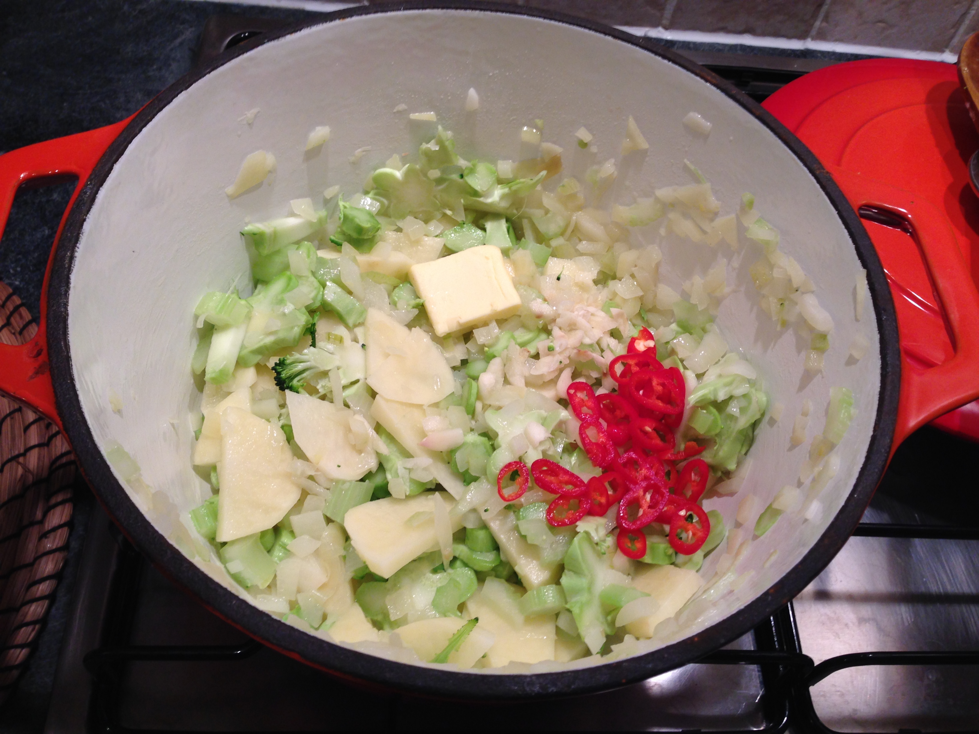 adding-ingredients-to-soup-pot