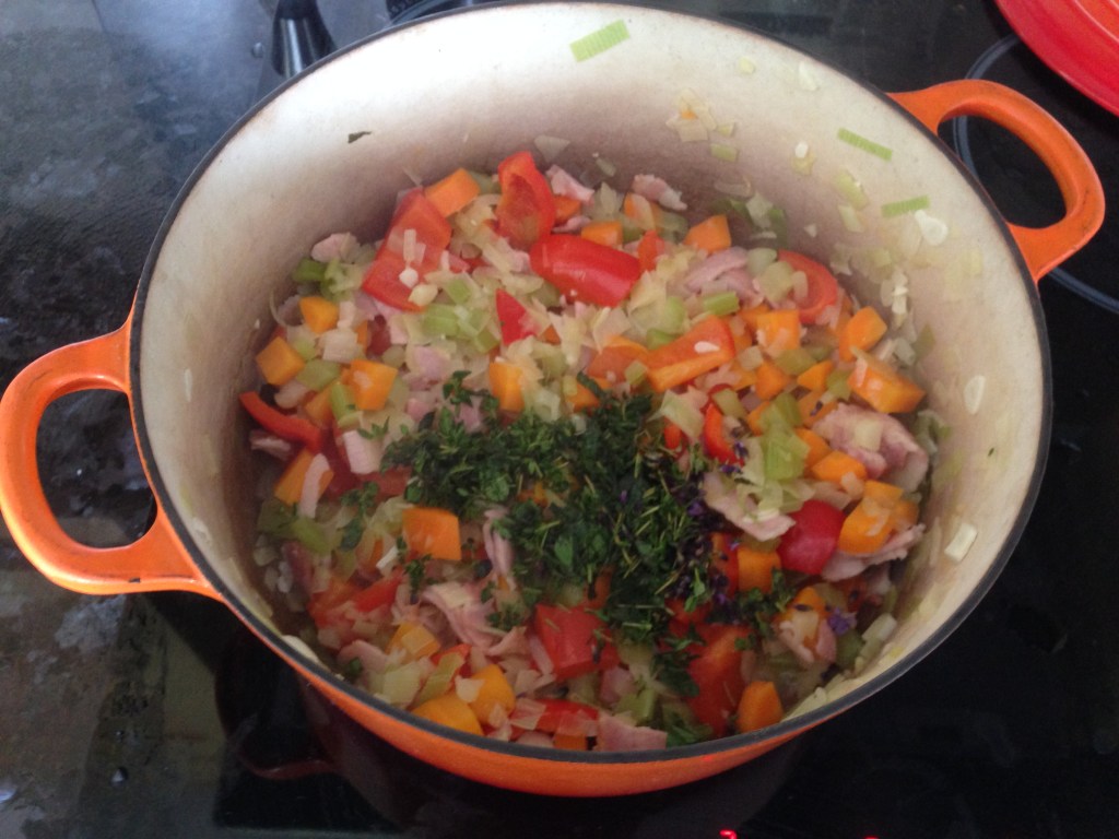 adding-herbs-and-lavender-to-soup