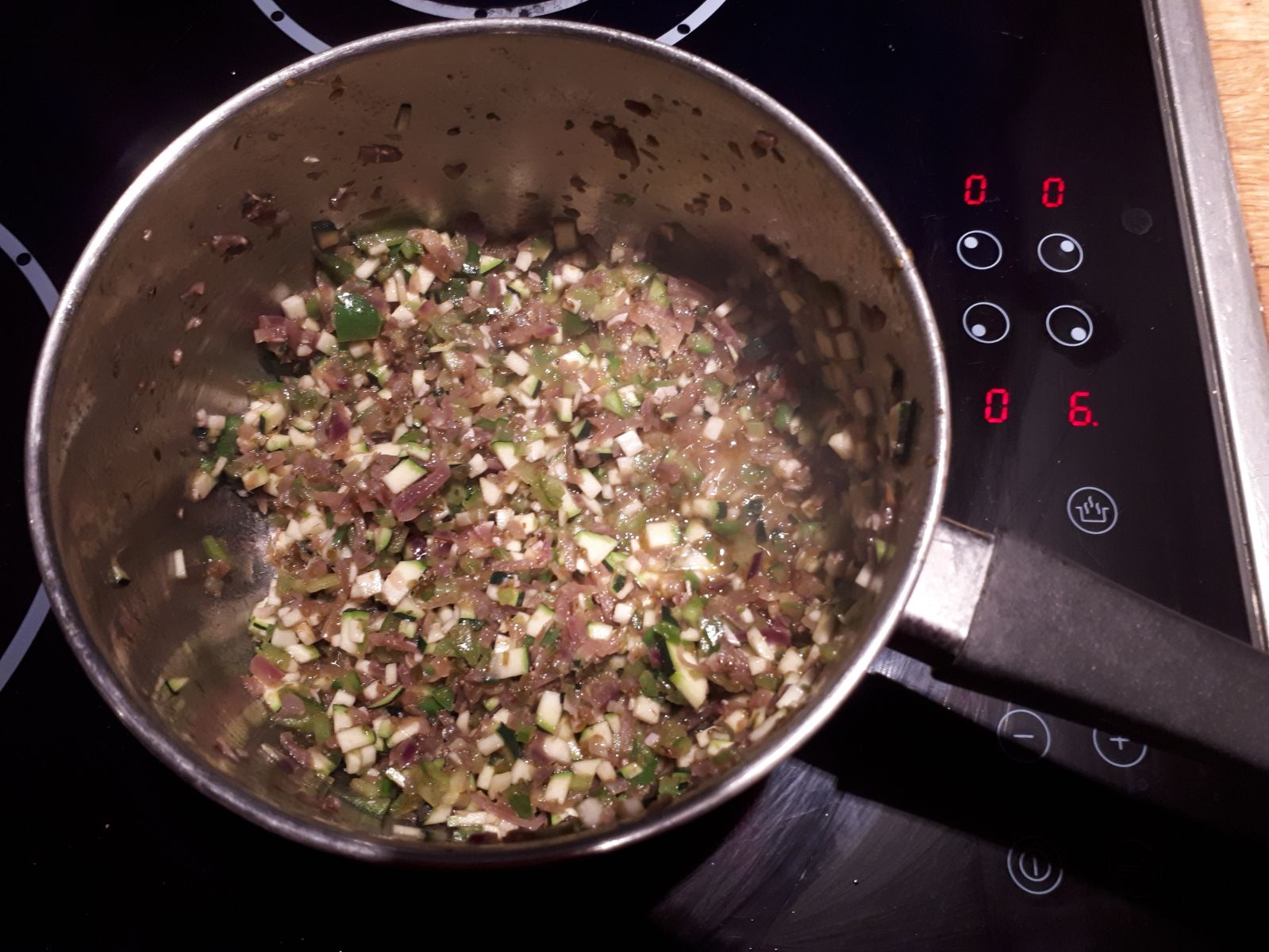 courgette-oregano-peppers-cooking-pan
